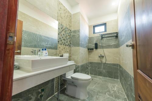 Ένα μπάνιο στο Residence 110 (Hotel and Apartments)
