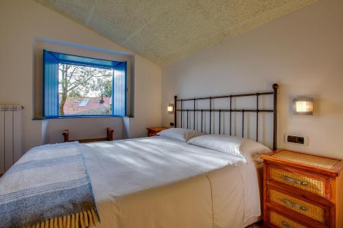 Кровать или кровати в номере Budiño de Serraseca