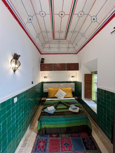 Postel nebo postele na pokoji v ubytování Riad Villa El Arsa