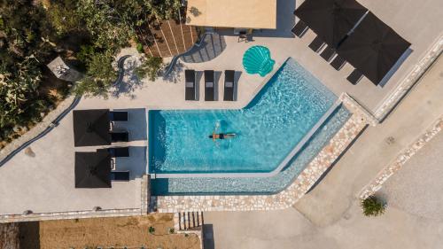 Bazén v ubytování WOW Panoramic View Deluxe Villas nebo v jeho okolí