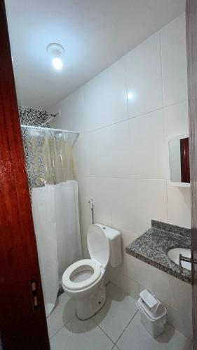 Ένα μπάνιο στο Casa confortável a 5min a pé da praia