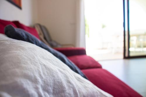 Ένα ή περισσότερα κρεβάτια σε δωμάτιο στο Residenze Branca I SeaView