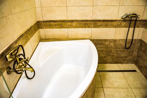 Ванная комната в Exclusive Apartmanok Szeged