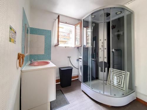 a bathroom with a glass shower and a sink at Chalet familial à St Marcel avec terrasse, 6 pers, 3 chambres - FR-1-344-1051 in Saint-Marcel