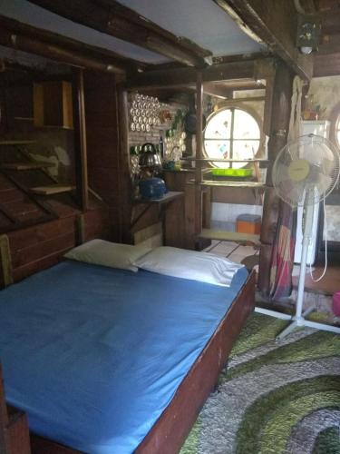 Llit o llits en una habitació de Casa Hobbit