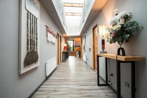 a corridor of a hallway with a ceiling at Maki Hotel in Pucón