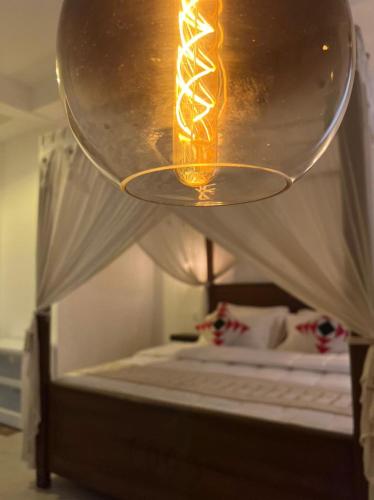 Una cama o camas en una habitación de Beverly Villa