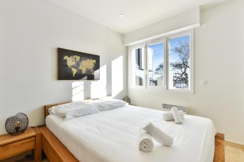 Кровать или кровати в номере Appartement Capri - Welkeys