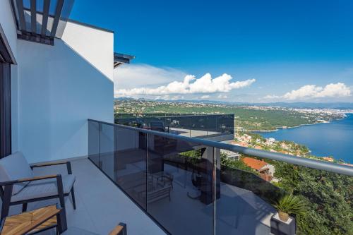 a balcony with a view of the water at Villa Platinium in Opatija