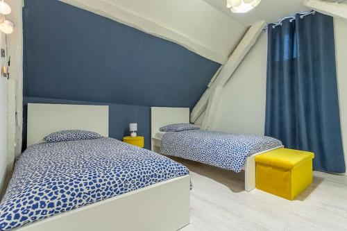 Posteľ alebo postele v izbe v ubytovaní L' appartement de la Paix