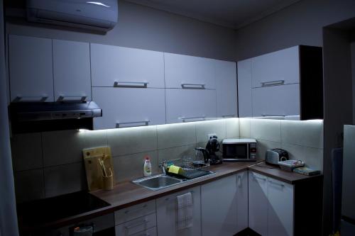 Kuchyňa alebo kuchynka v ubytovaní Gerti Apartman 2