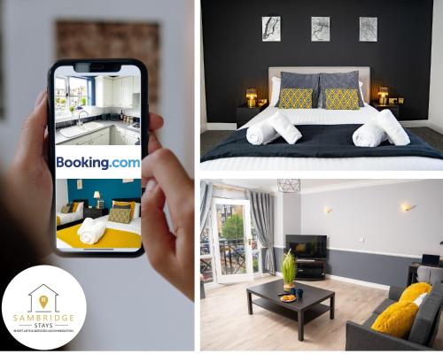 a person taking a picture of a bedroom at The Marina View by Sambridge Stays in Hemel Hempstead