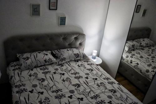 Ліжко або ліжка в номері Mirna Oaza - Peaceful Oasis