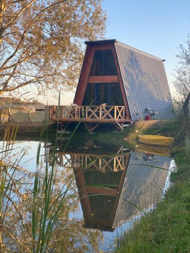 a bridge over a body of water at Secret Lake Tayakadın in Arnavutköy