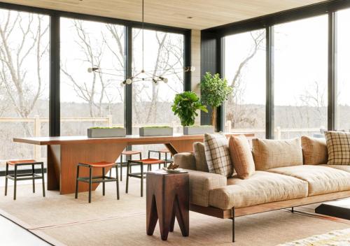 a living room with a couch and a table at AutoCamp Cape Cod in Falmouth