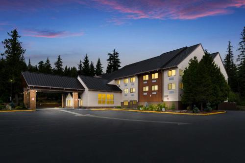 a rendering of a house with a parking lot at Best Western Mt. Hood Inn in Government Camp