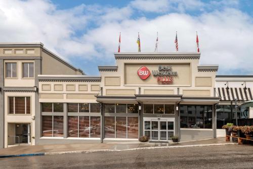 a building with a stop sign on top of it at Best Western Plus Baker Street Inn in Nelson