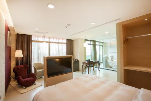 Postel nebo postele na pokoji v ubytování 823 Tourist Hotel