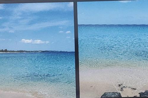 a view of the ocean from a beach at Summer all year! Oceanfront with Pool A/C in Aguadilla