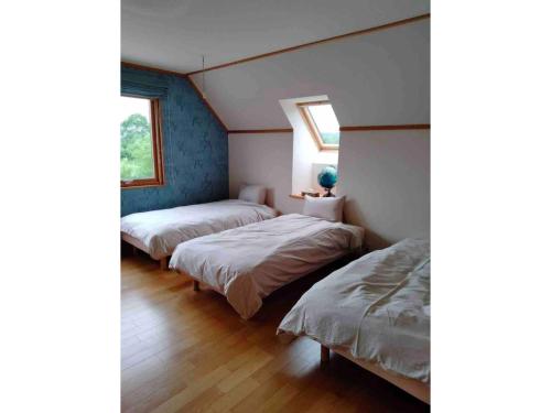 Postel nebo postele na pokoji v ubytování Farm Inn Torch B - Vacation STAY 92724v