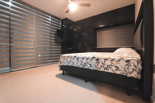 Katil atau katil-katil dalam bilik di Casa Tacuba / Amplio Departamento moderno con terraza