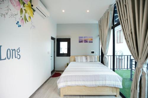 Postel nebo postele na pokoji v ubytování Private room in Halong center-Almor Homestay