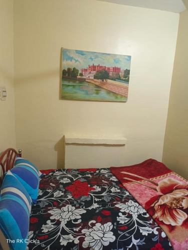 Postel nebo postele na pokoji v ubytování Karina art Home stay