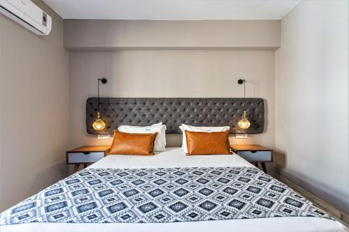 Cama o camas de una habitación en Minaret Suites and Apartments