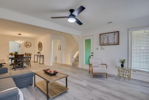 a living room with a couch and a table at Beautiful 3BR Townhouse Close to Downtown Augusta in Augusta