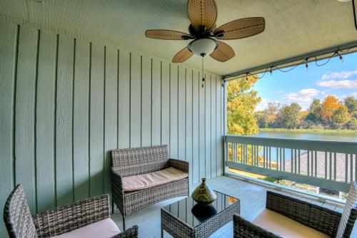 a porch with a ceiling fan and a chair and a table at Beautiful 3BR Townhouse Close to Downtown Augusta in Augusta