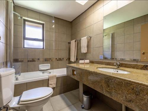 Kúpeľňa v ubytovaní Leisure Time Rentals - Sanbonani Resort & Spa