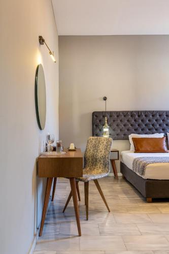 Cama o camas de una habitación en Minaret Suites and Apartments