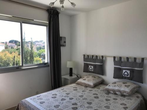 Posteľ alebo postele v izbe v ubytovaní Appartement spacieux et calme classé 4 etoiles, à 300m de la mer