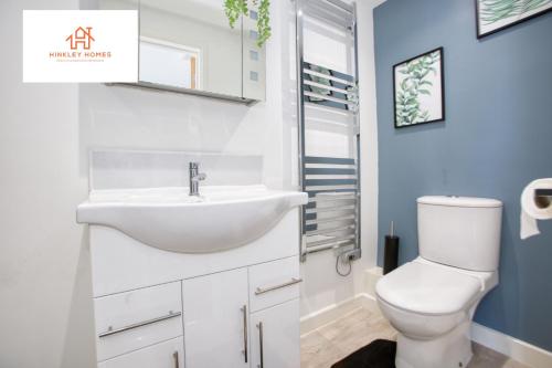 a bathroom with a sink and a toilet at Cozy & Elegant 1bedroom House in Somerset Sleeps 2 By Hinkley Homes Short Lets & Serviced Accommodation in Bridgwater