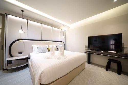 Katil atau katil-katil dalam bilik di Movenpick Pool villa by Angkana