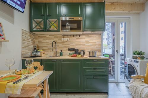 Kuchyň nebo kuchyňský kout v ubytování Casa SOLE- Loft moderno in montagna