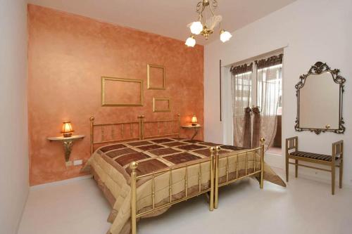 En eller flere senge i et værelse på Cozy Flat in Trastevere