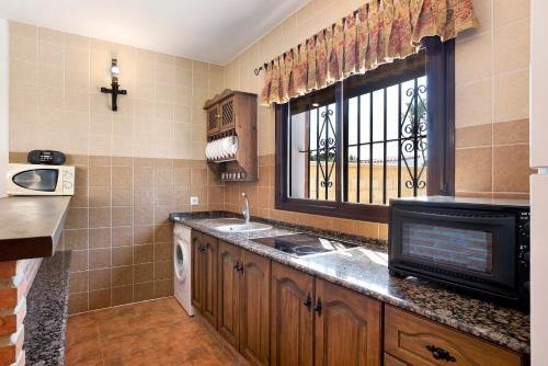 Kuchyň nebo kuchyňský kout v ubytování Casa Zahora