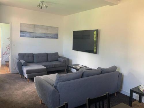 Posezení v ubytování Dugal Cottage