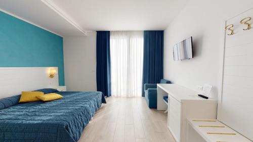 Postel nebo postele na pokoji v ubytování Hotel Zunino