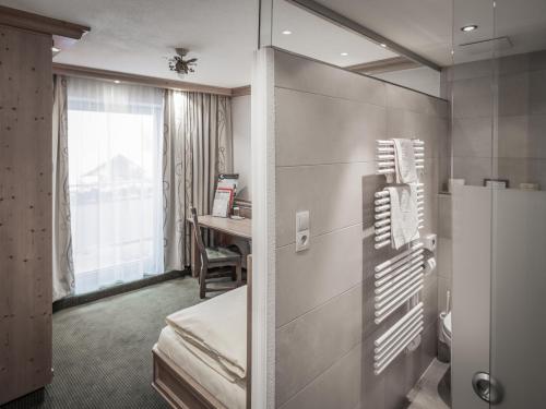 Koupelna v ubytování Hotel Alpenland