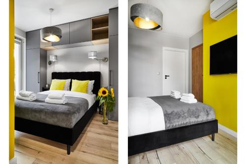 1 dormitorio con cama y pared amarilla en HOUSEHOST Apartment :Miodowa 42/4a, en Cracovia