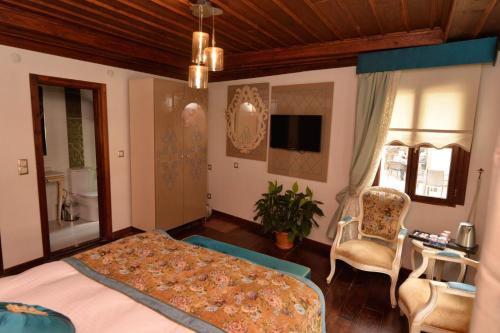 Katil atau katil-katil dalam bilik di Arasta Konak Otel