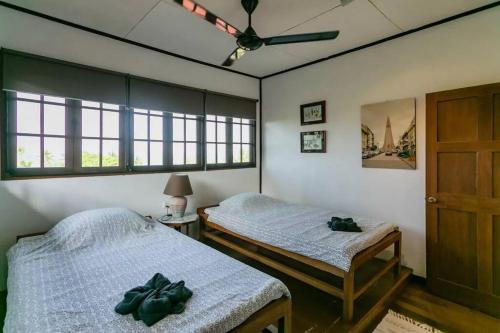 Postel nebo postele na pokoji v ubytování Elysia Nongsa 70 Batam Luxury Villa