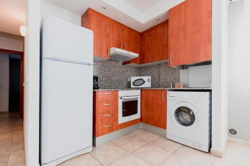  Apartamentos Tarter 3000 -  Room  picture :   TV    Kitchenette    Refrigerator                           