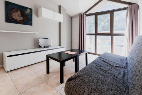  Apartamentos Tarter 3000 -  Room  picture :   TV    Kitchenette    Refrigerator                           