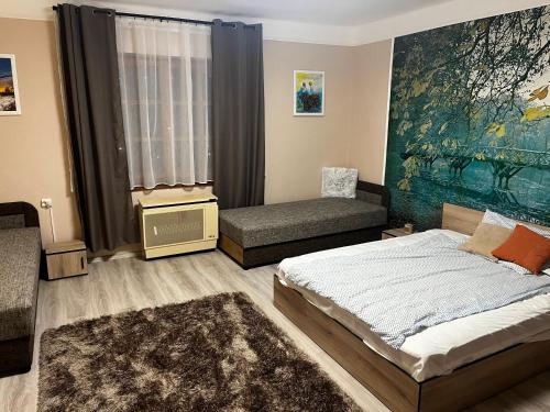 Posteľ alebo postele v izbe v ubytovaní Postakocsi Vendégház Kisgyőr
