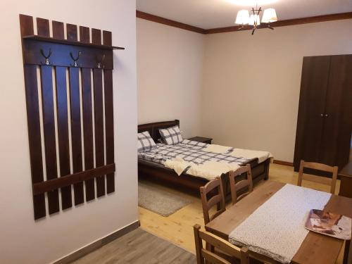 Кровать или кровати в номере Bereg-Travel