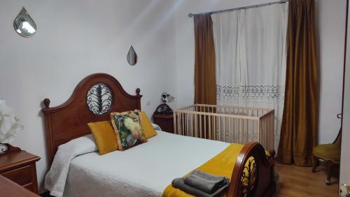 Postel nebo postele na pokoji v ubytování Casa" VISTAS AL TEIDE" mar Piscina privada parking cubierto gratuito en las instalaciones