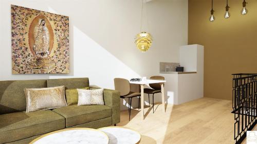 uma sala de estar com um sofá e uma mesa em Residentie d'Ouwe Kercke em Terneuzen